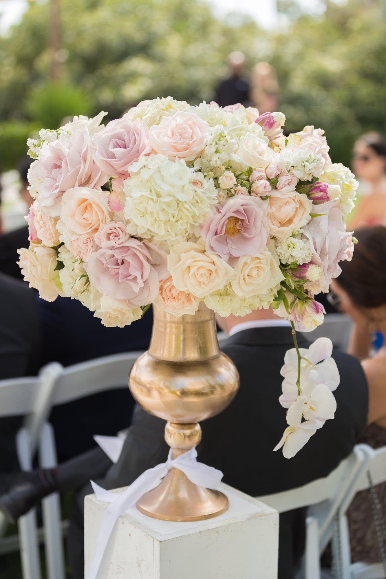 Blush and white wedding flowers at the reception