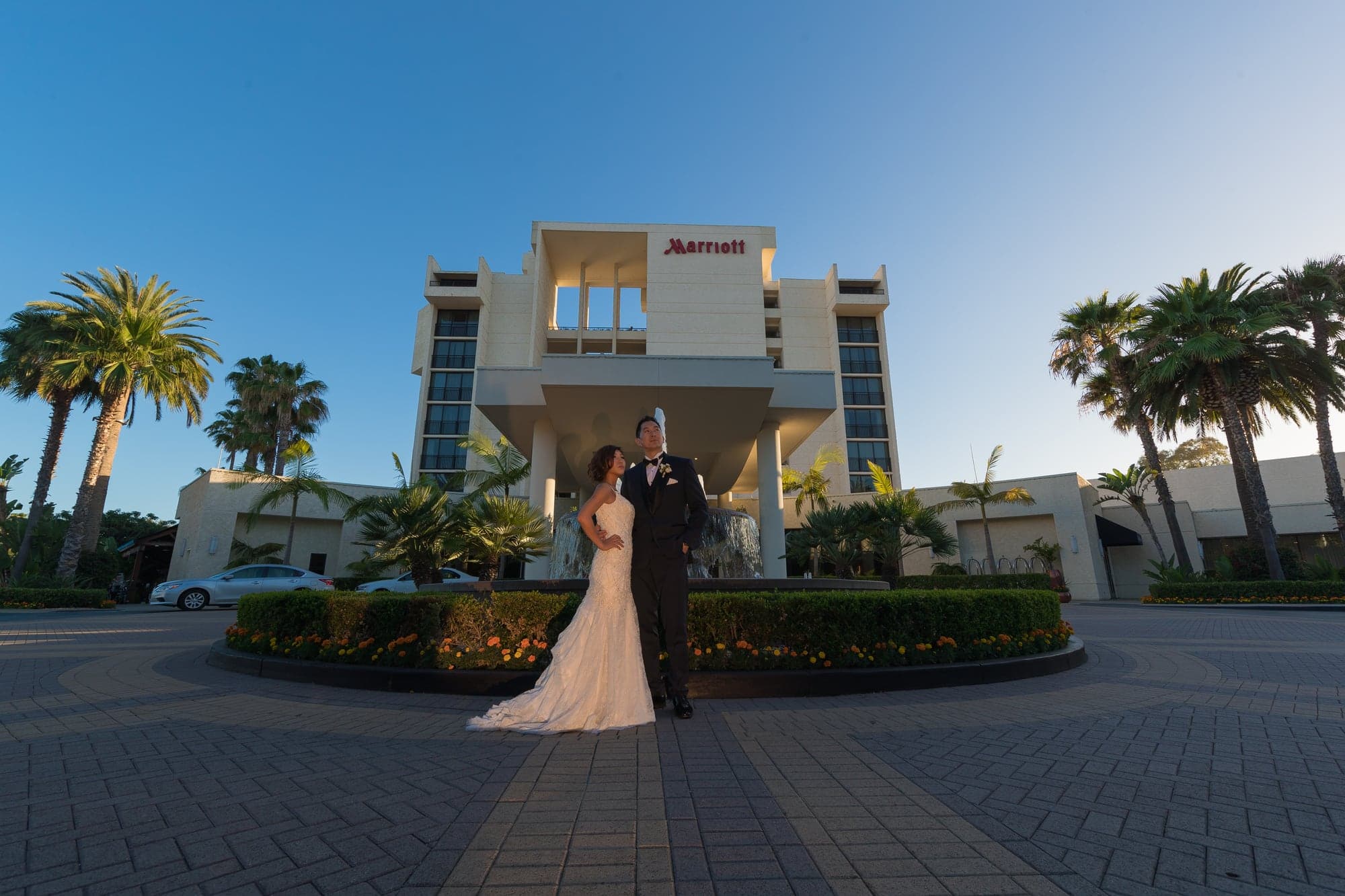 Vianne and Alan outside the Newport Beach Marriott at dusk