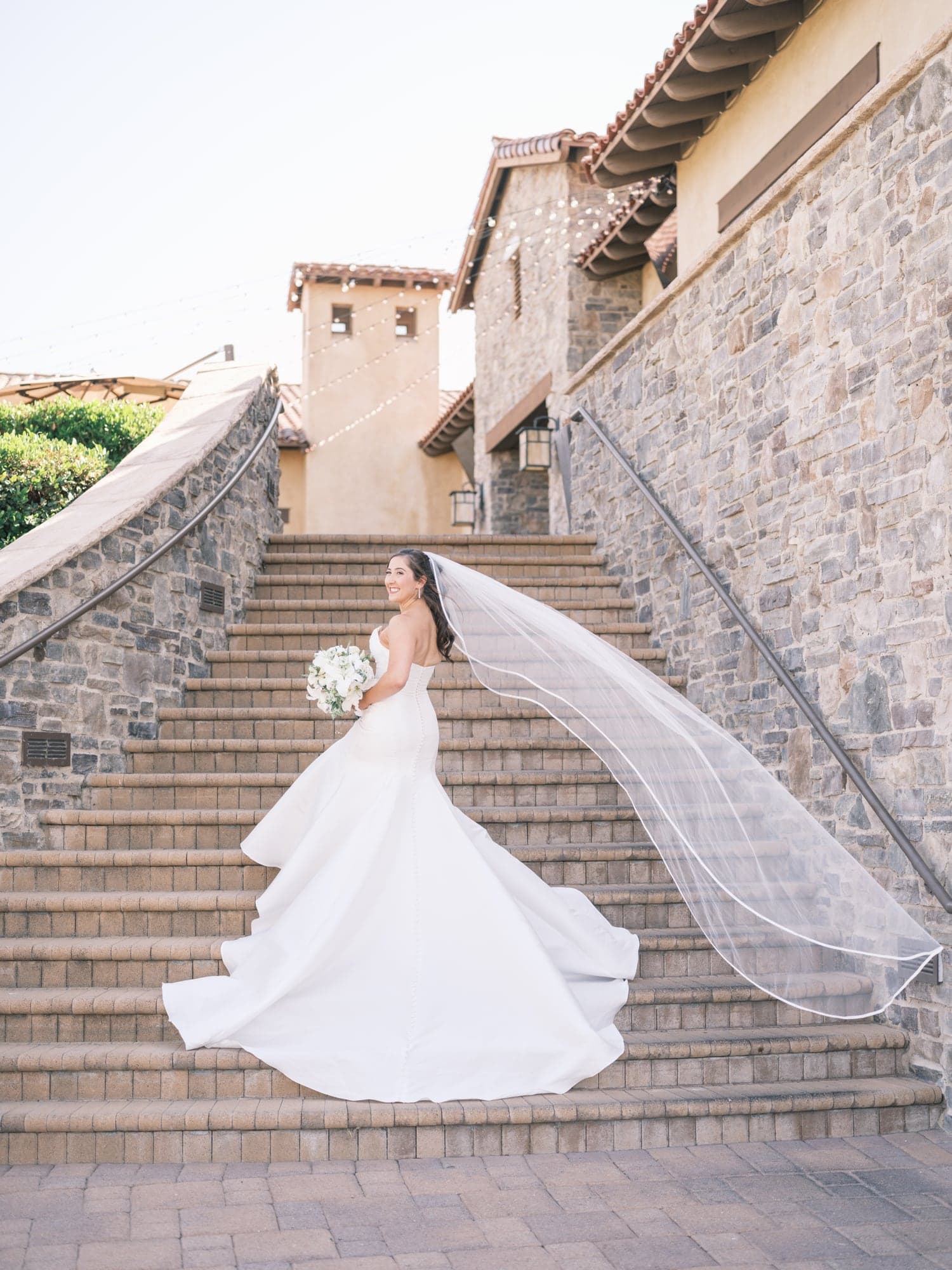 Katherine on the stone clubhouse stairs