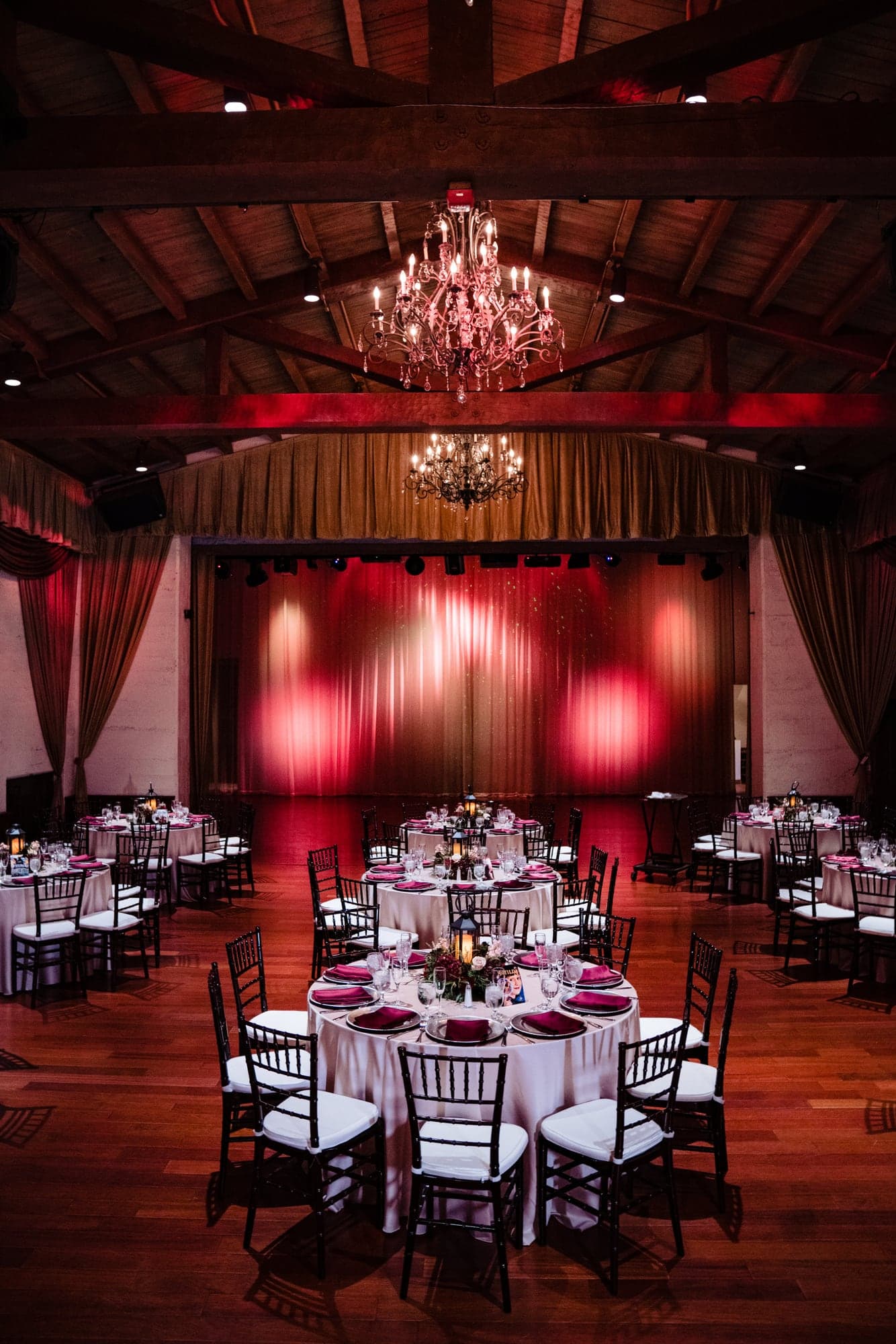 Red-lit reception room at Padua Hills Theatre