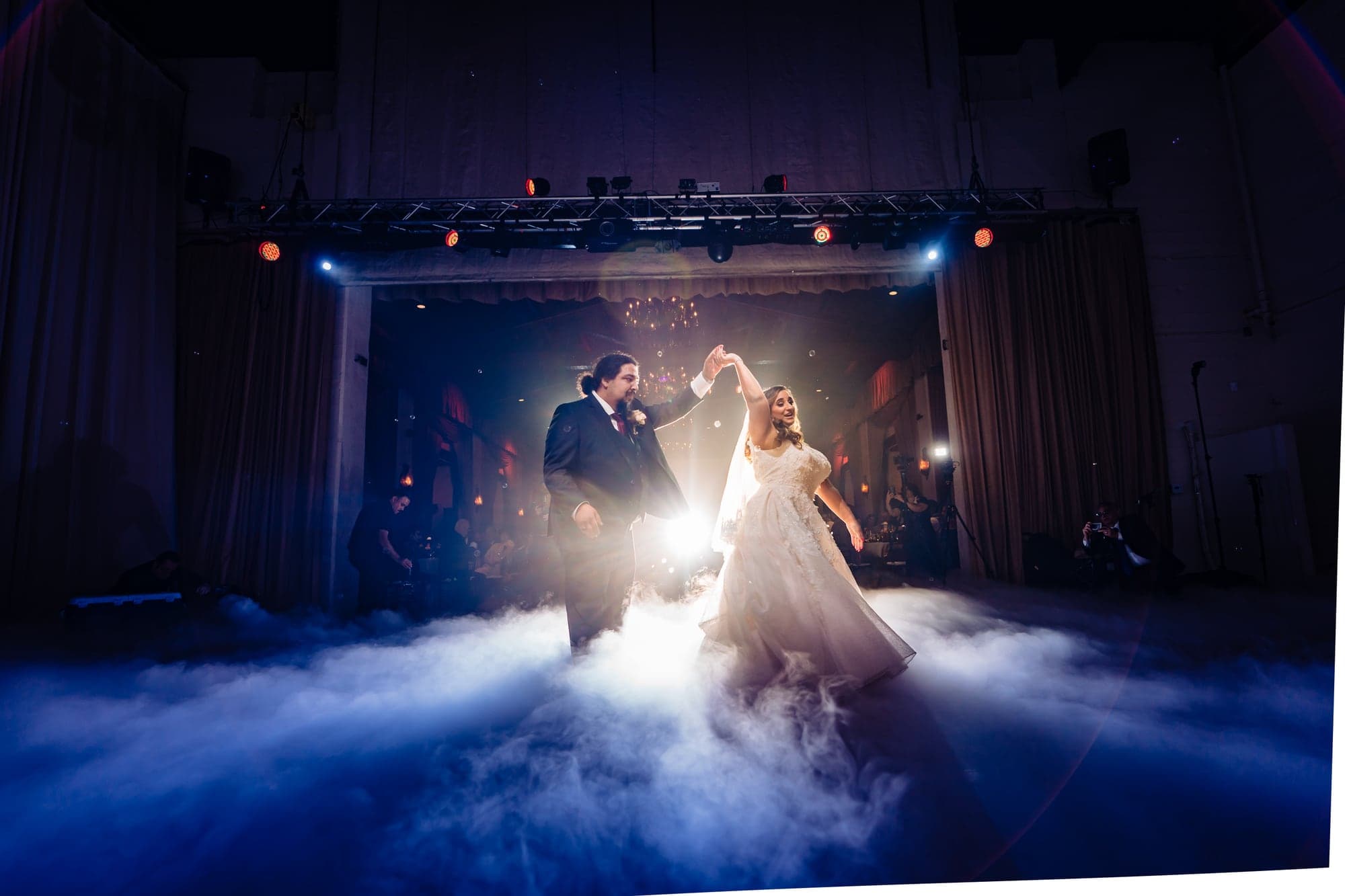 Nareen and Jesse dancing through low fog at Padua Hills Theatre