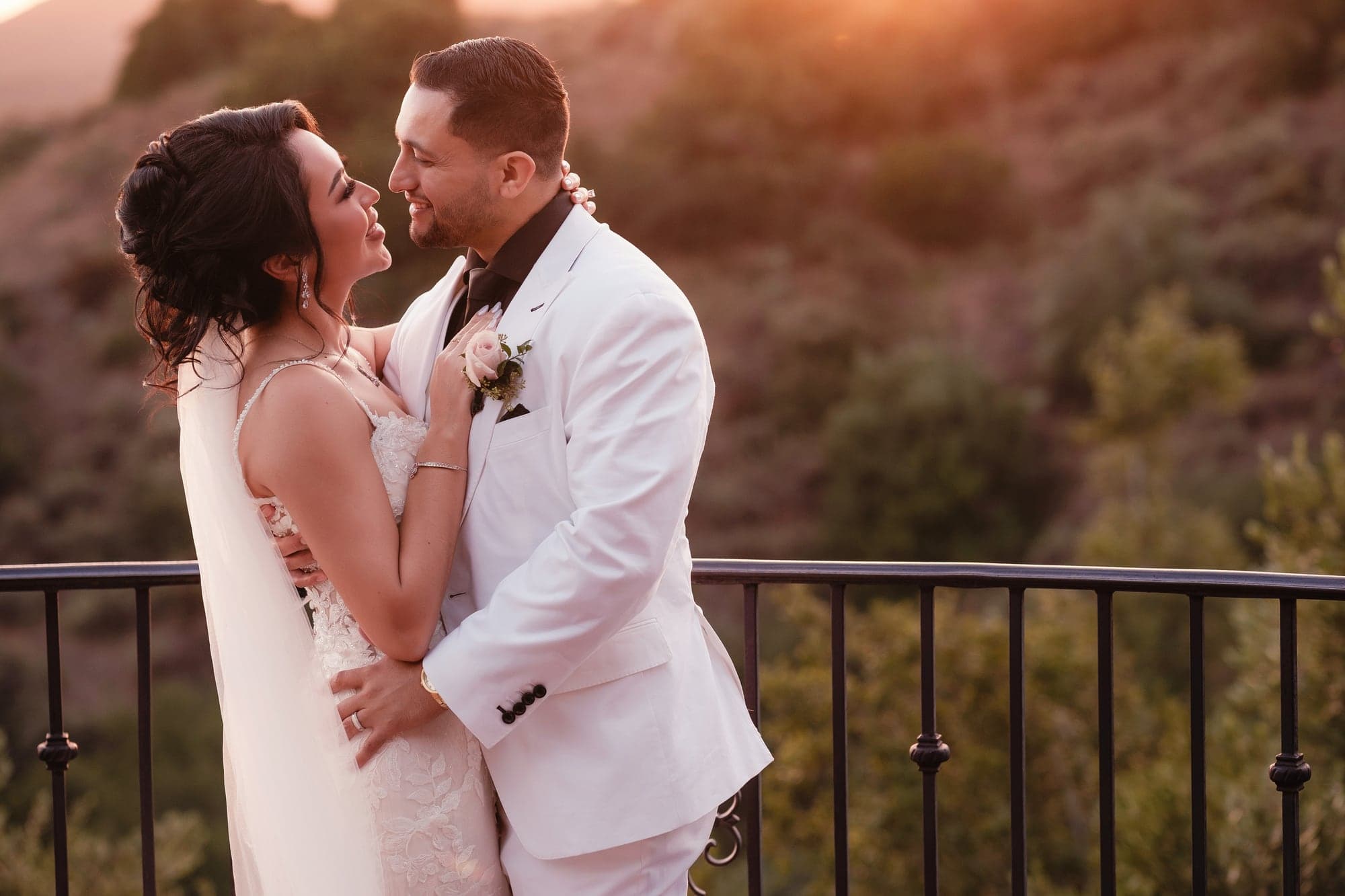 Mayling and David embracing during portraits at Padua Hills