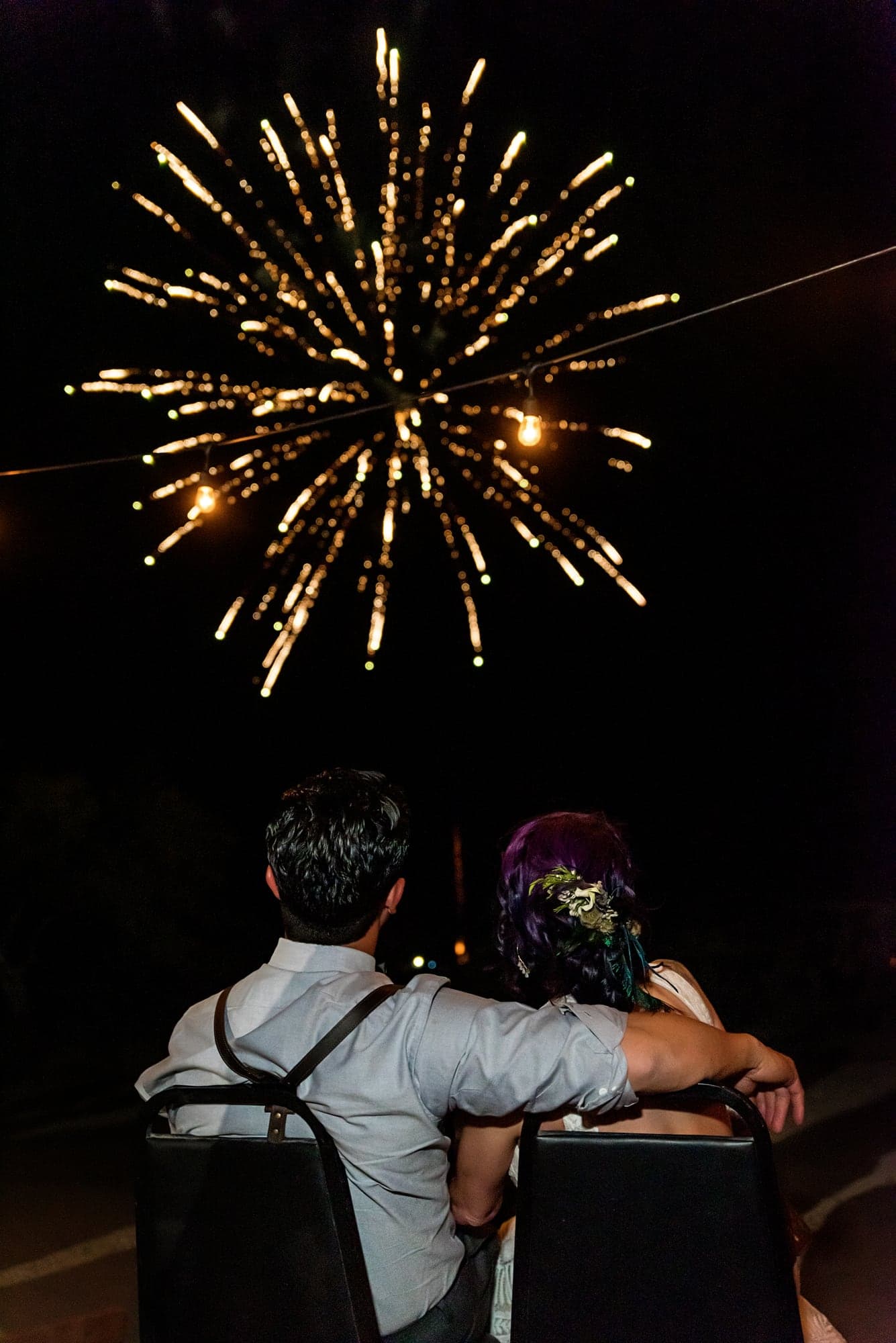 Fireworks lighting the night sky after the desert wedding