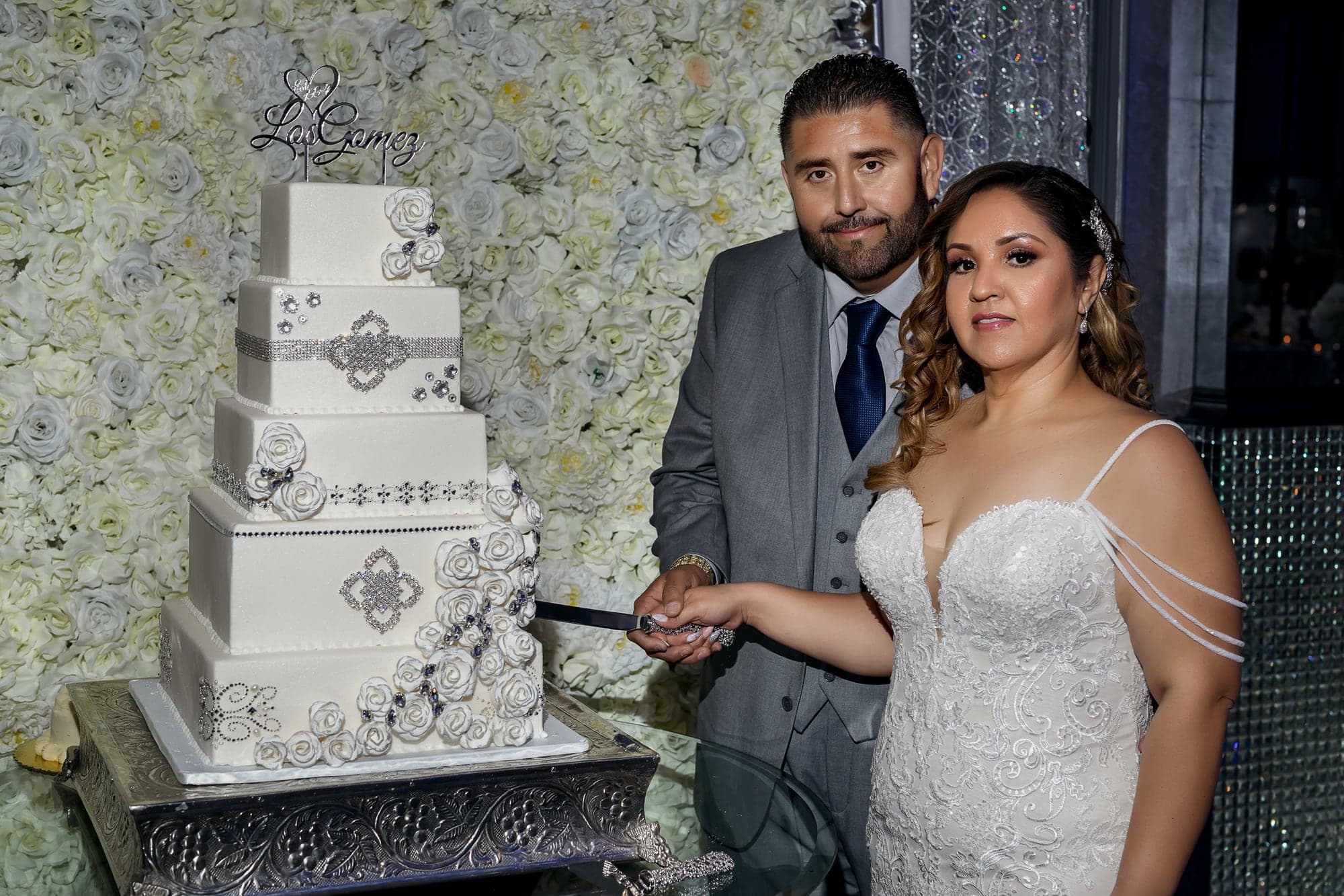 Francisco and Alejandra beside their anniversary cake