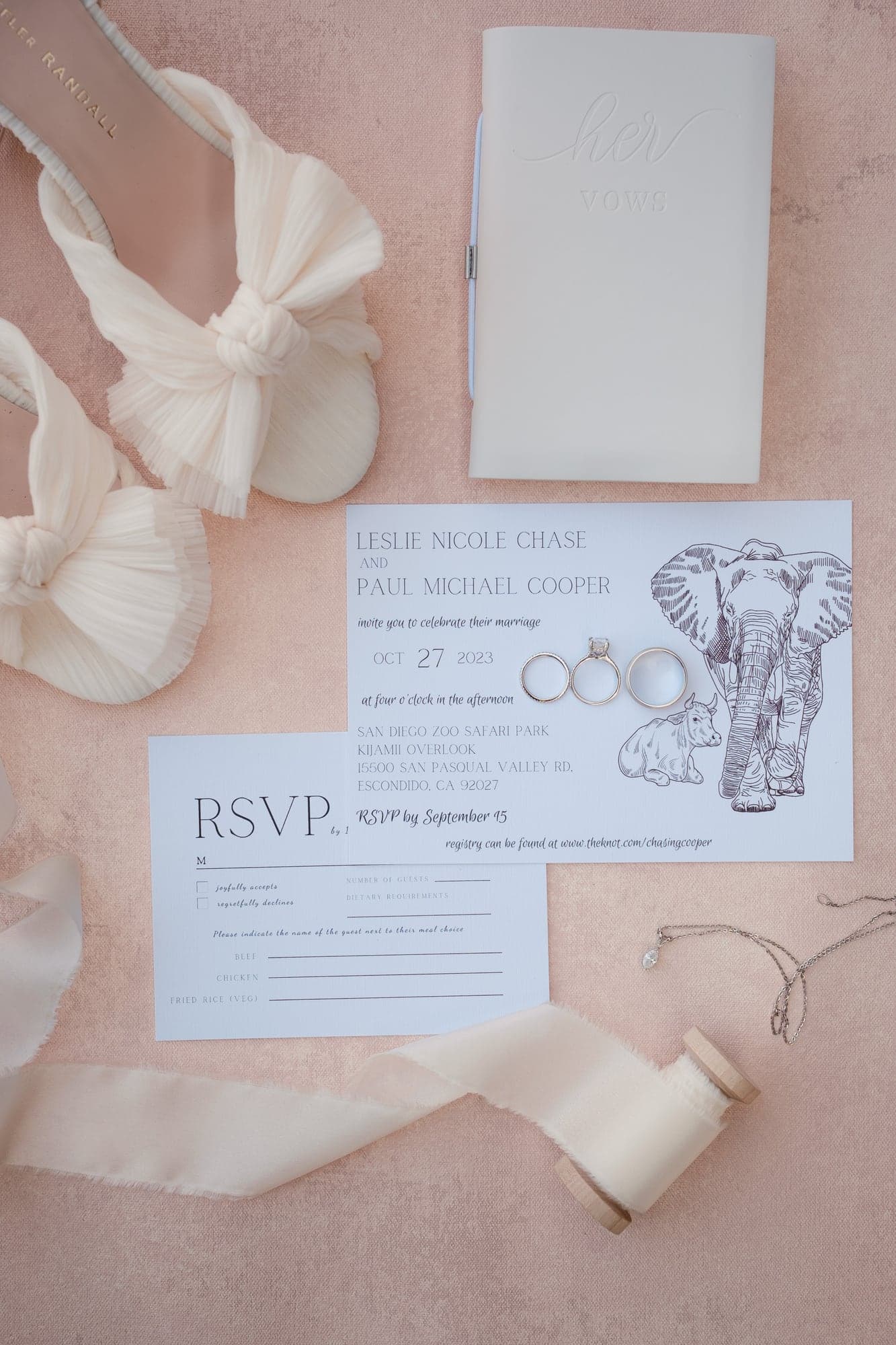 Leslie and Paul's Safari Park wedding invitation with an elephant illustration