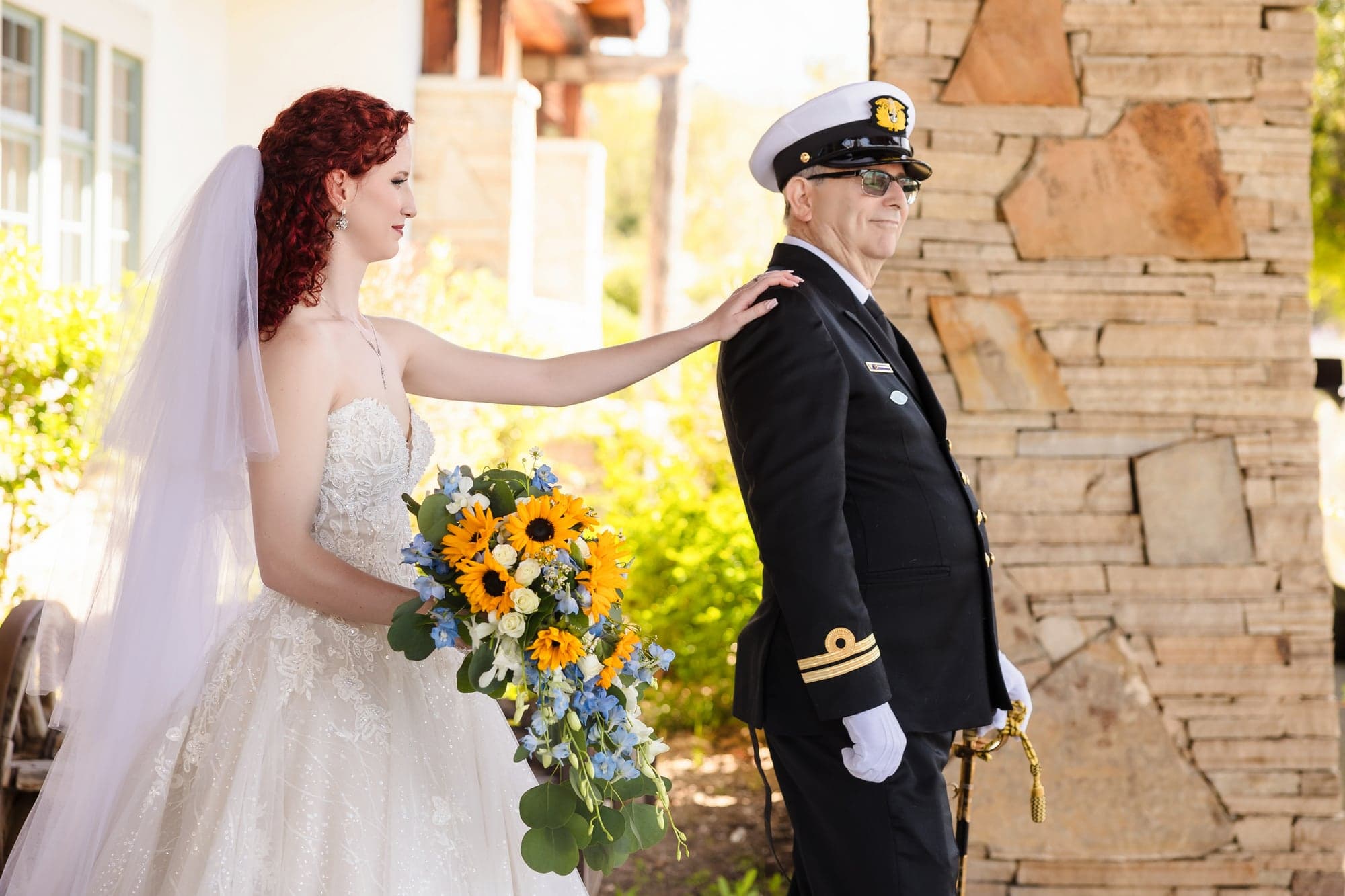 Maria greeting John in military dress before the ceremony