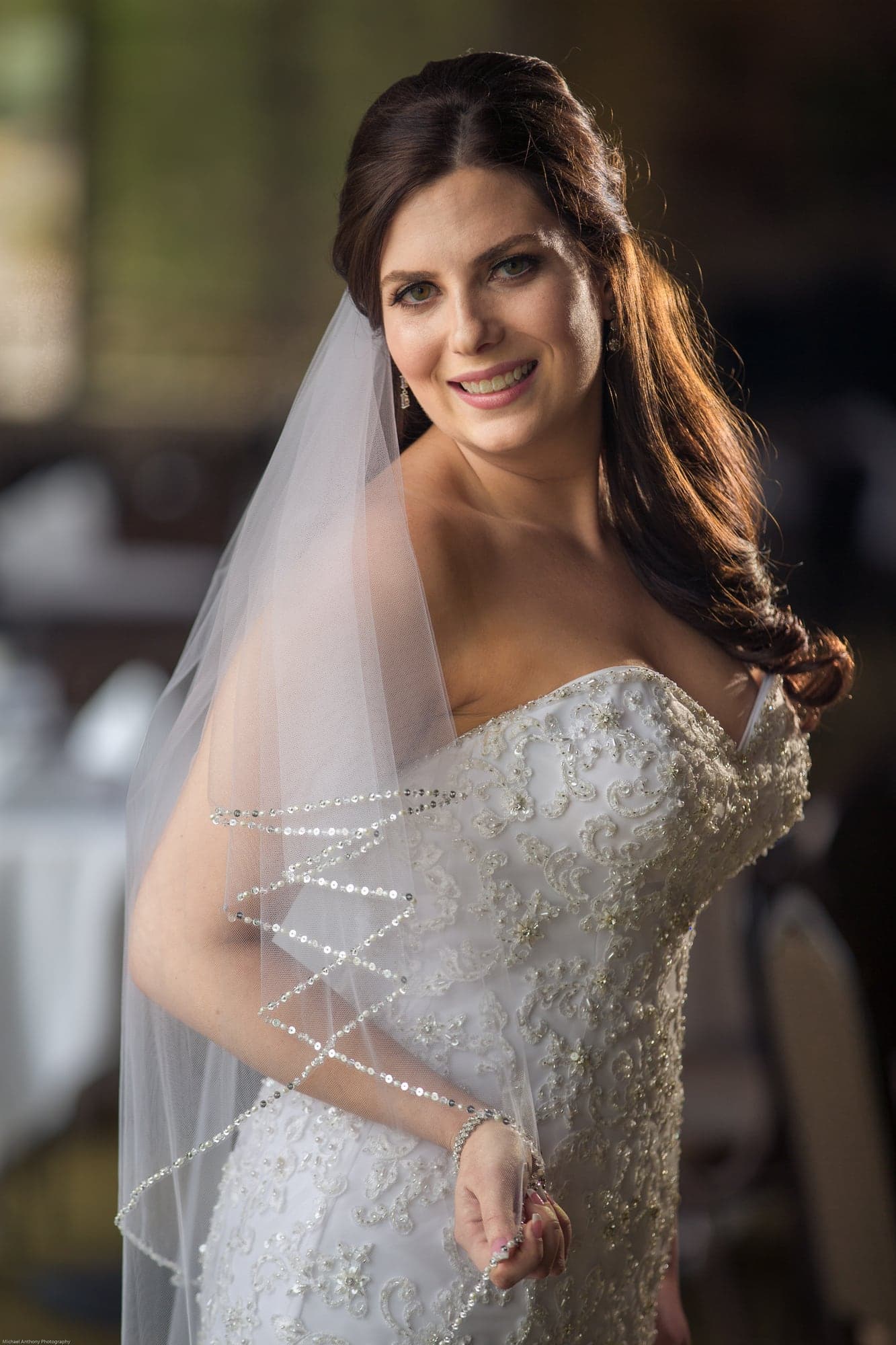 Bride preparing in window light at Sand Canyon Ranch