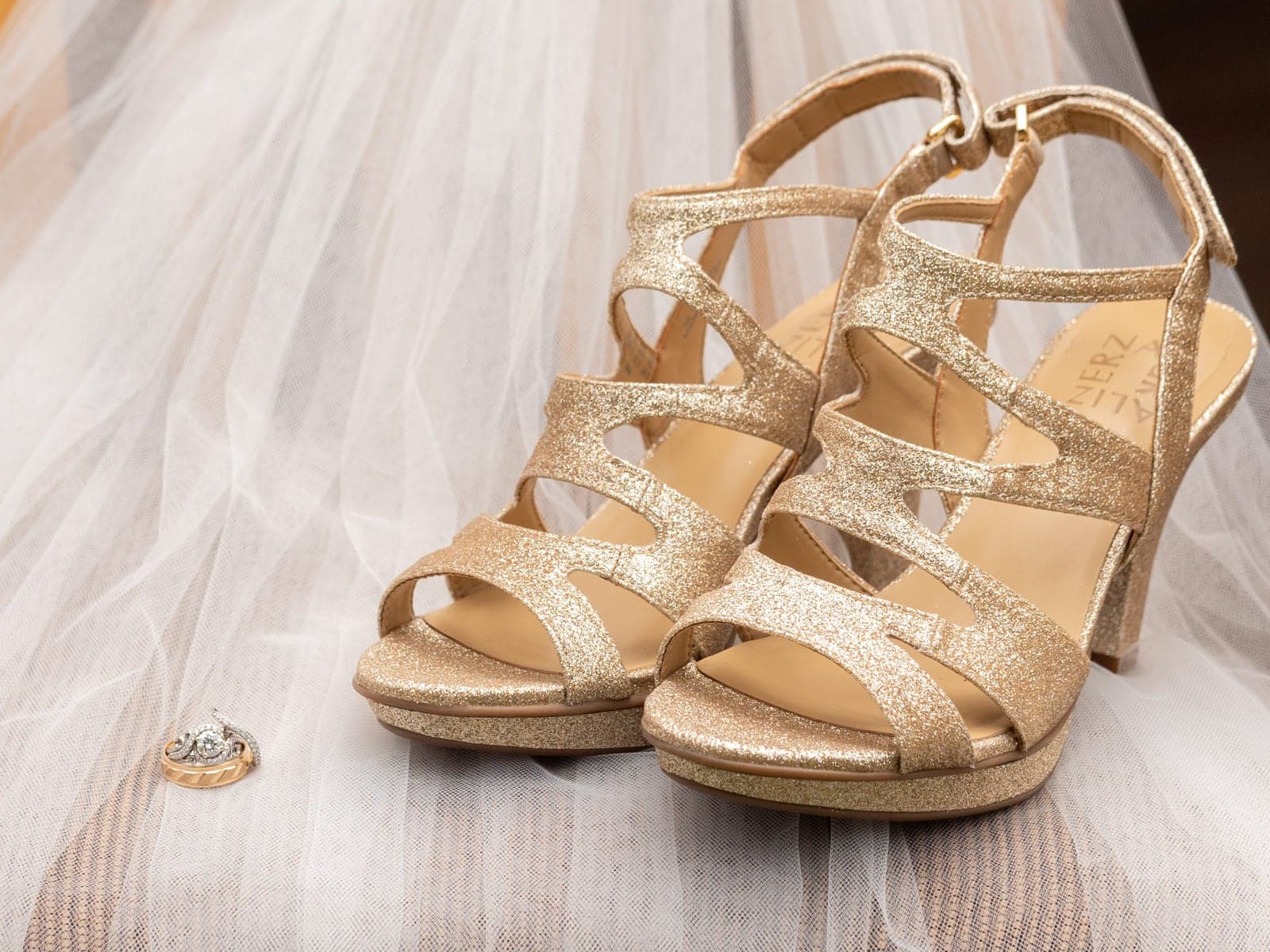 Lauren's gold wedding shoes
