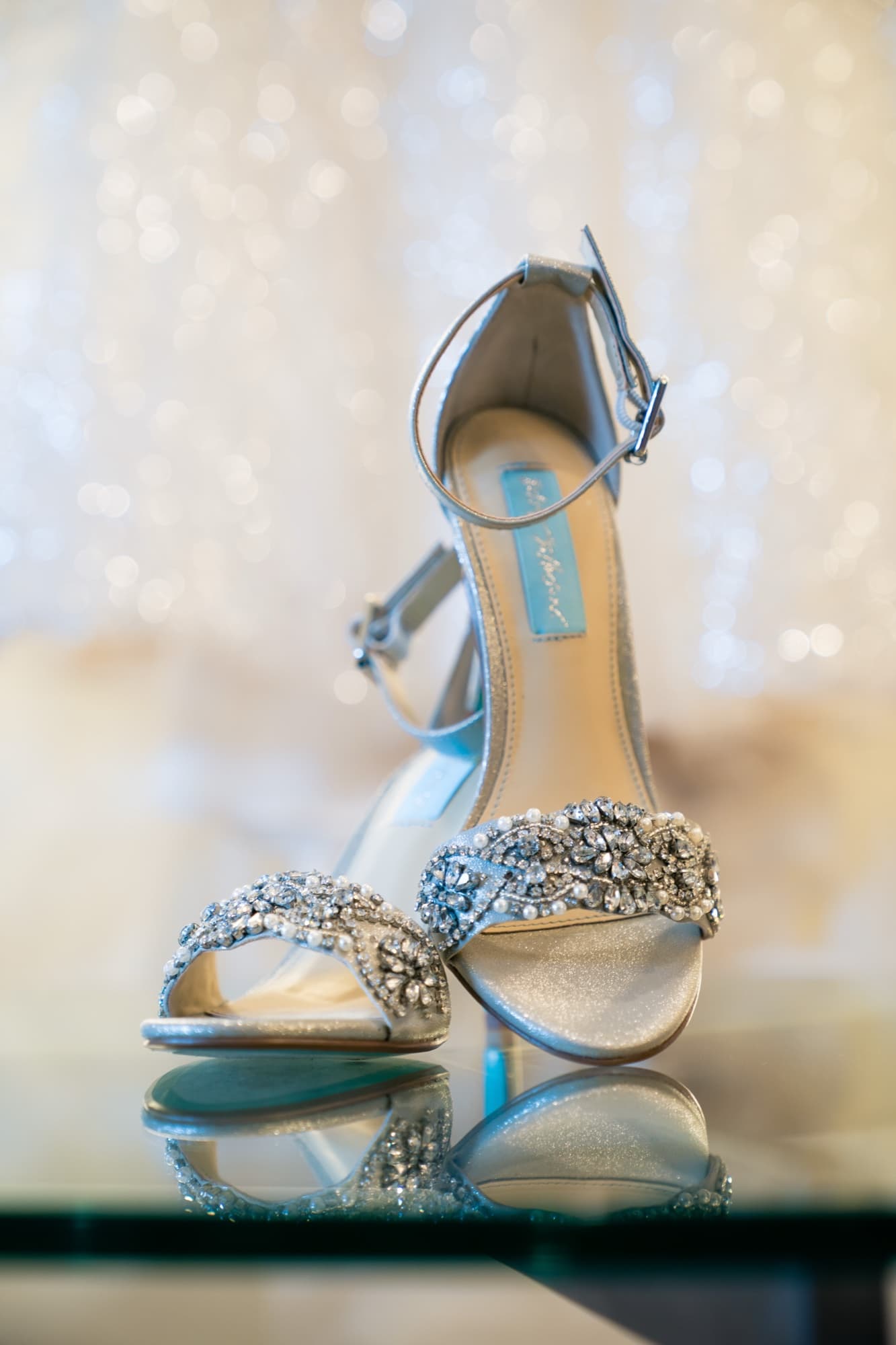 Rachel's crystal-embellished heels catching the light before the Skirball wedding