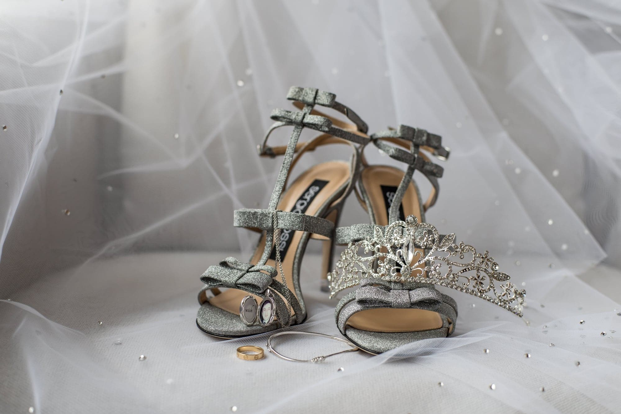 Christina's silver wedding shoes and jewelry