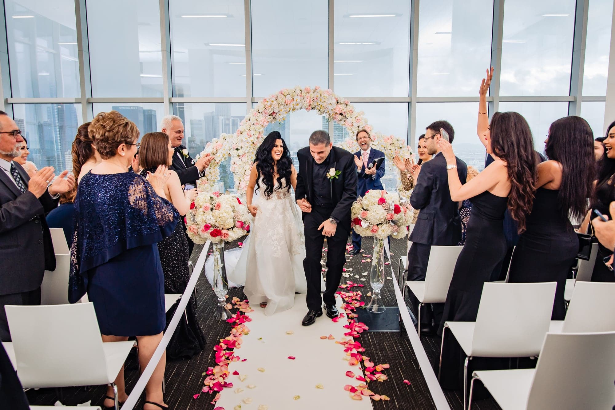 Christina and Sahak walking back down the ceremony aisle