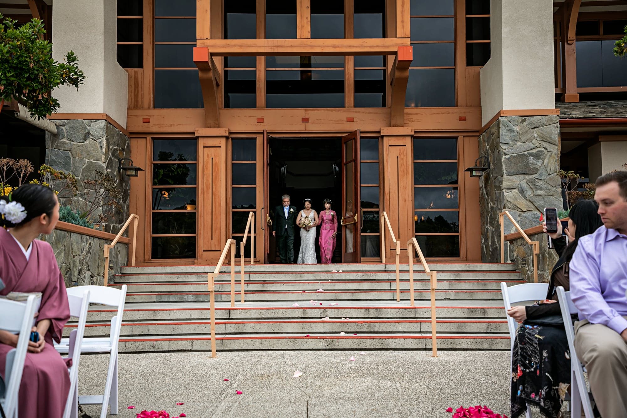 Wedding ceremony in front of the Craftsman lodge