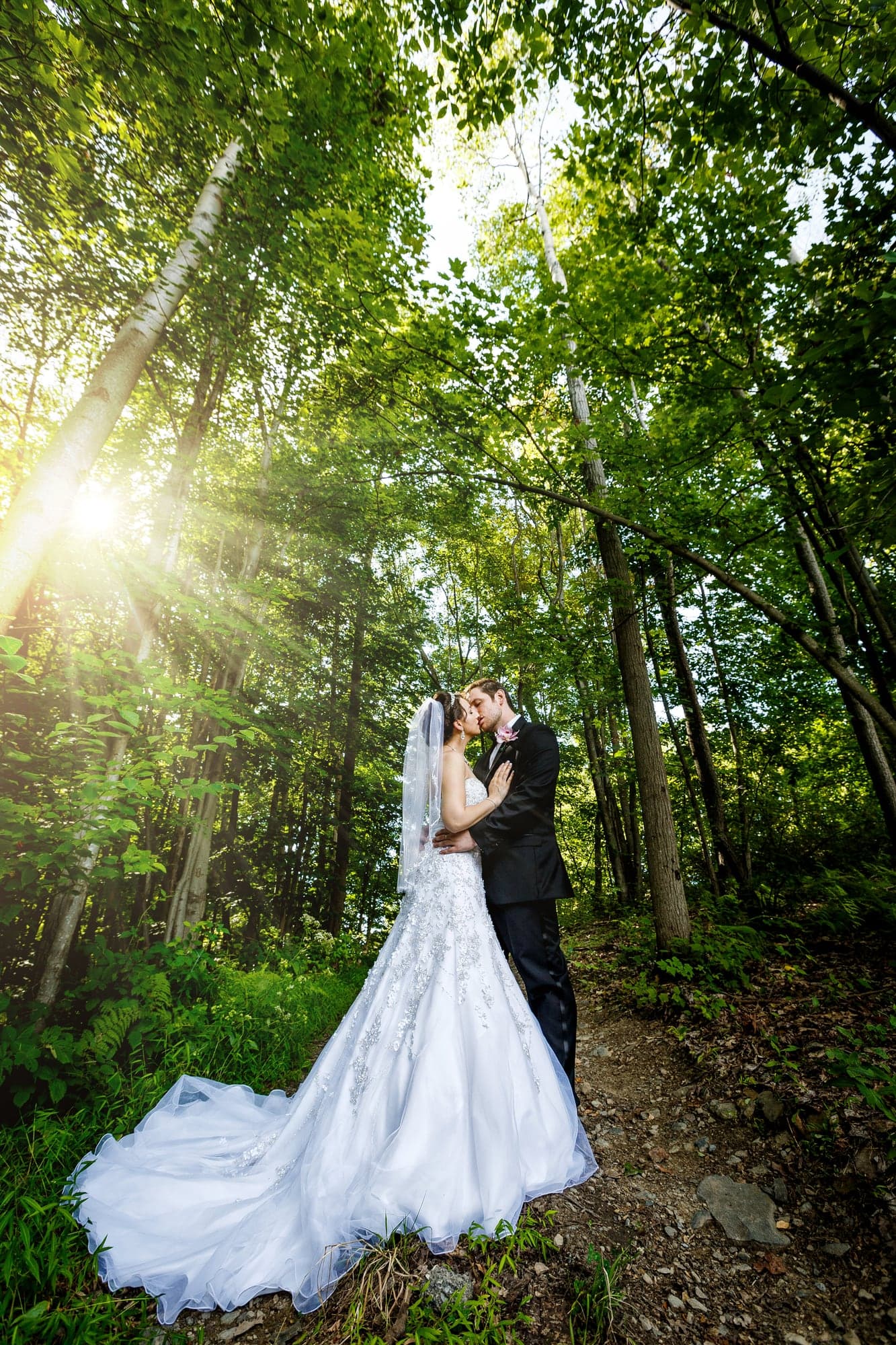 The Nicolais couple beneath the trees