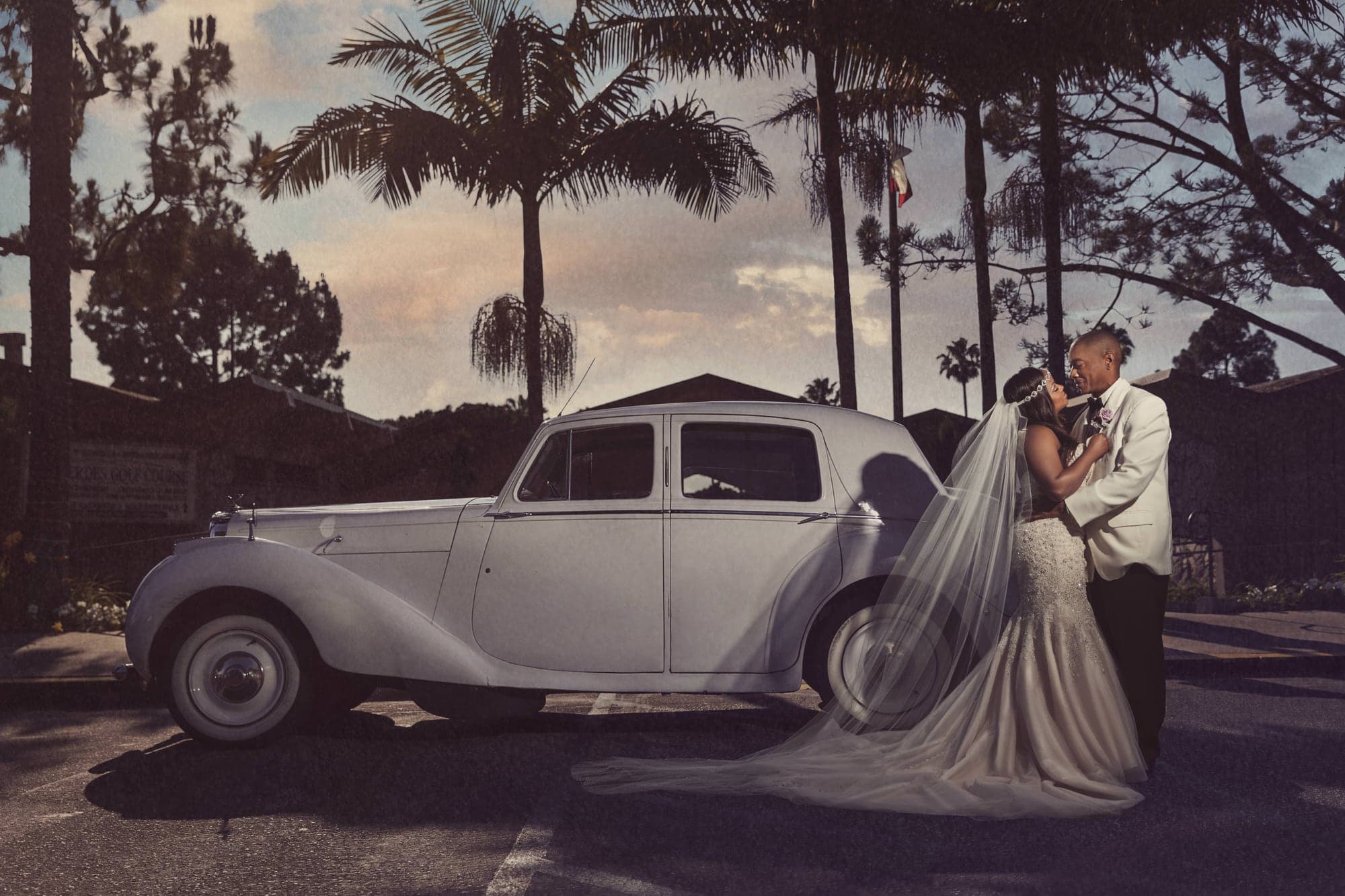 Wedding veil moving in the coastal breeze at sunset