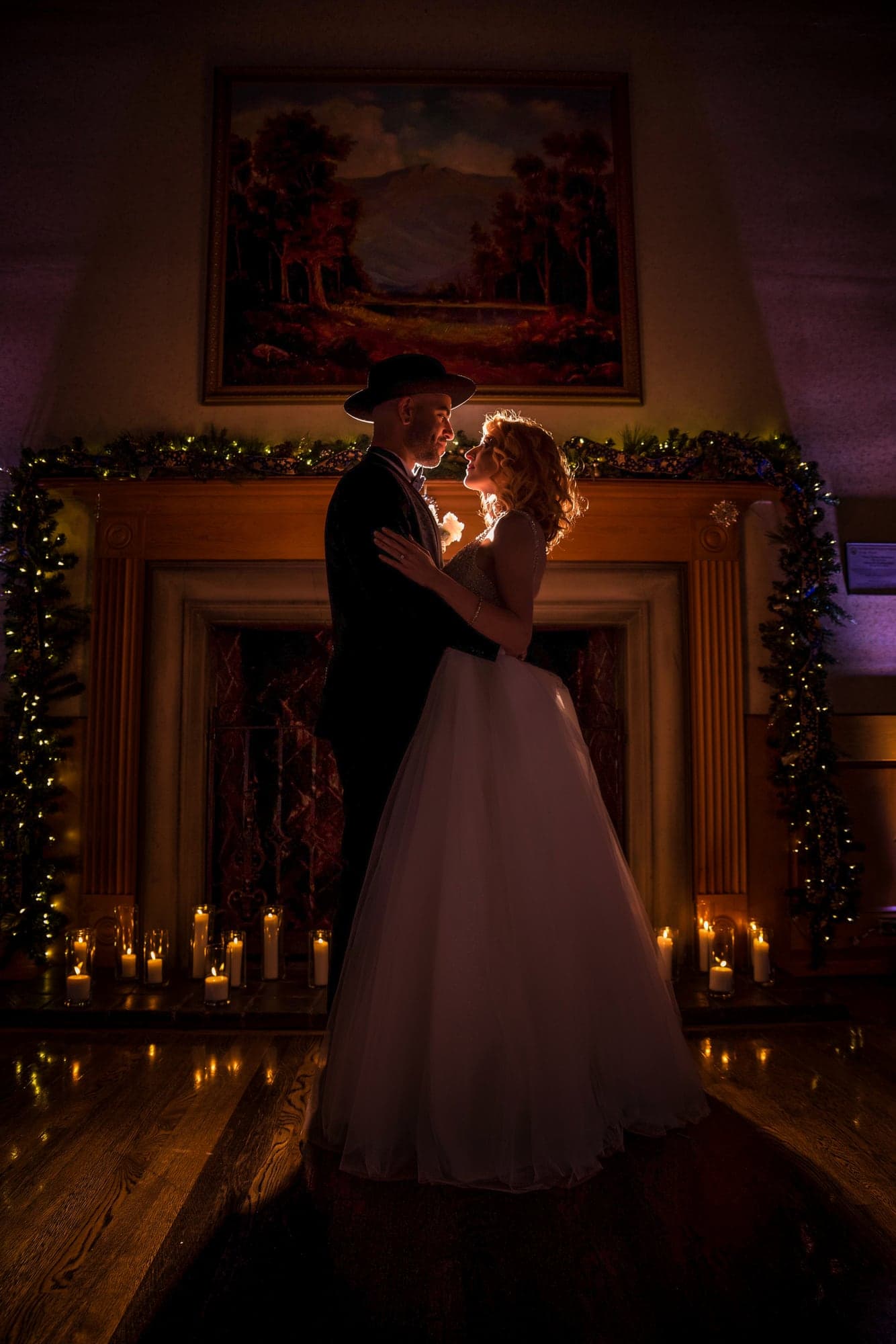 Melissa and Aaron framed in a warm doorway