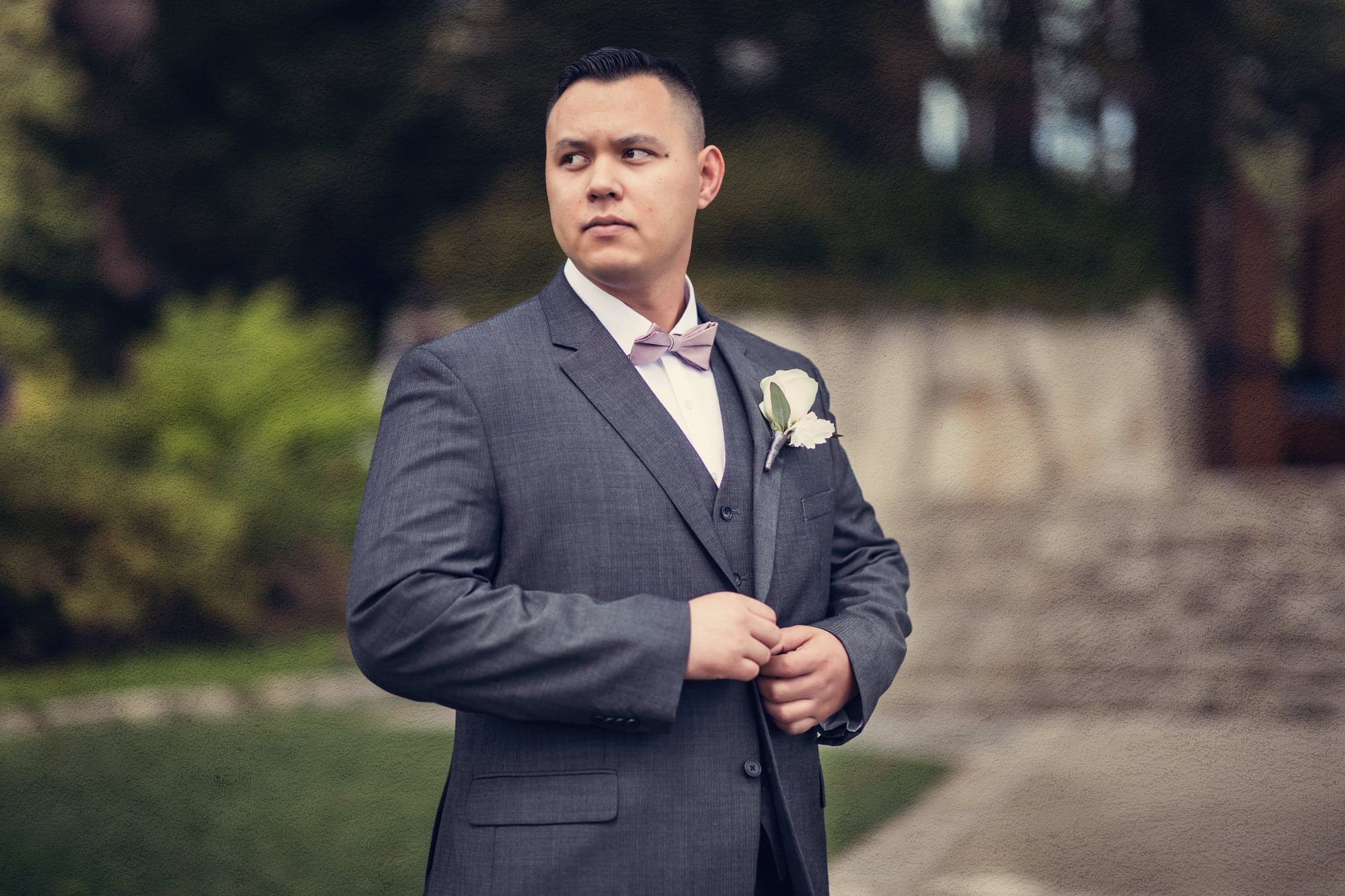 Groom waiting outside before the first look