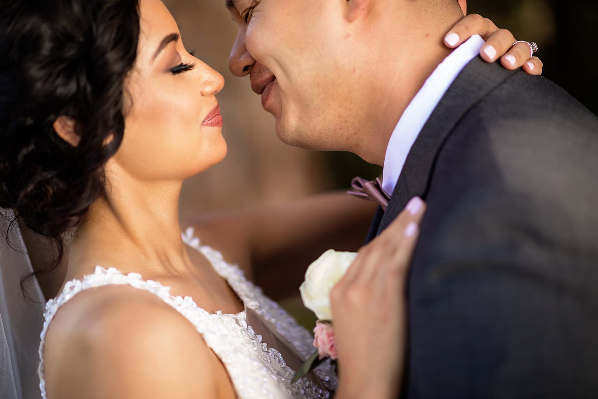 Bride and groom in a close portrait after their ceremony