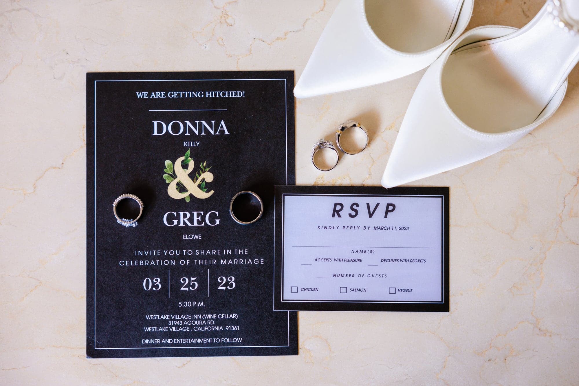 Donna and Greg's black-and-white invitation suite and wedding rings