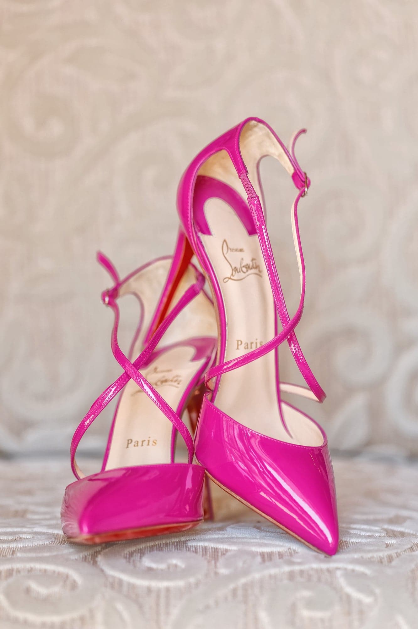 Hot pink wedding shoes before the Melanson ceremony