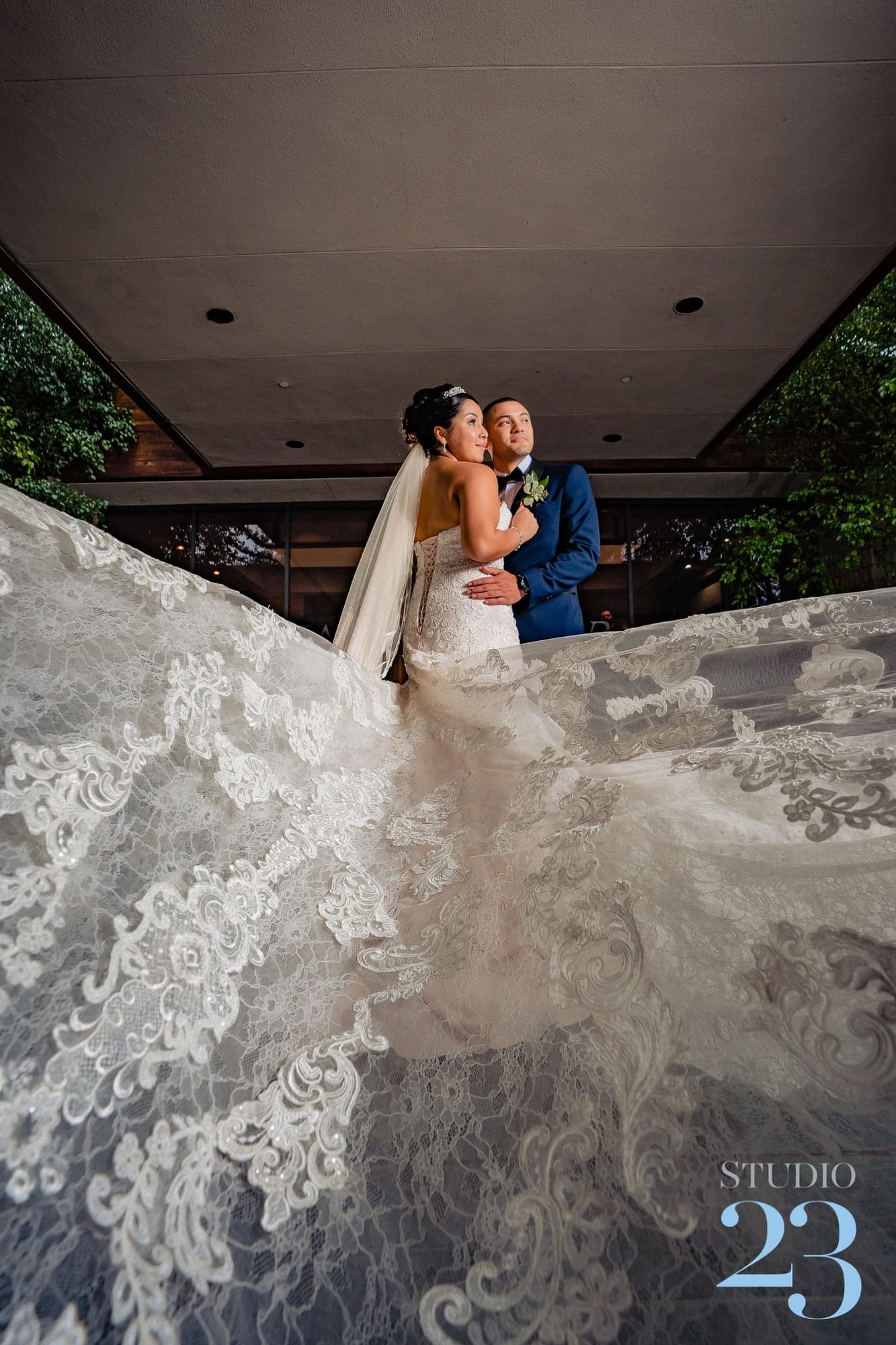 Bea beneath her flowing wedding veil