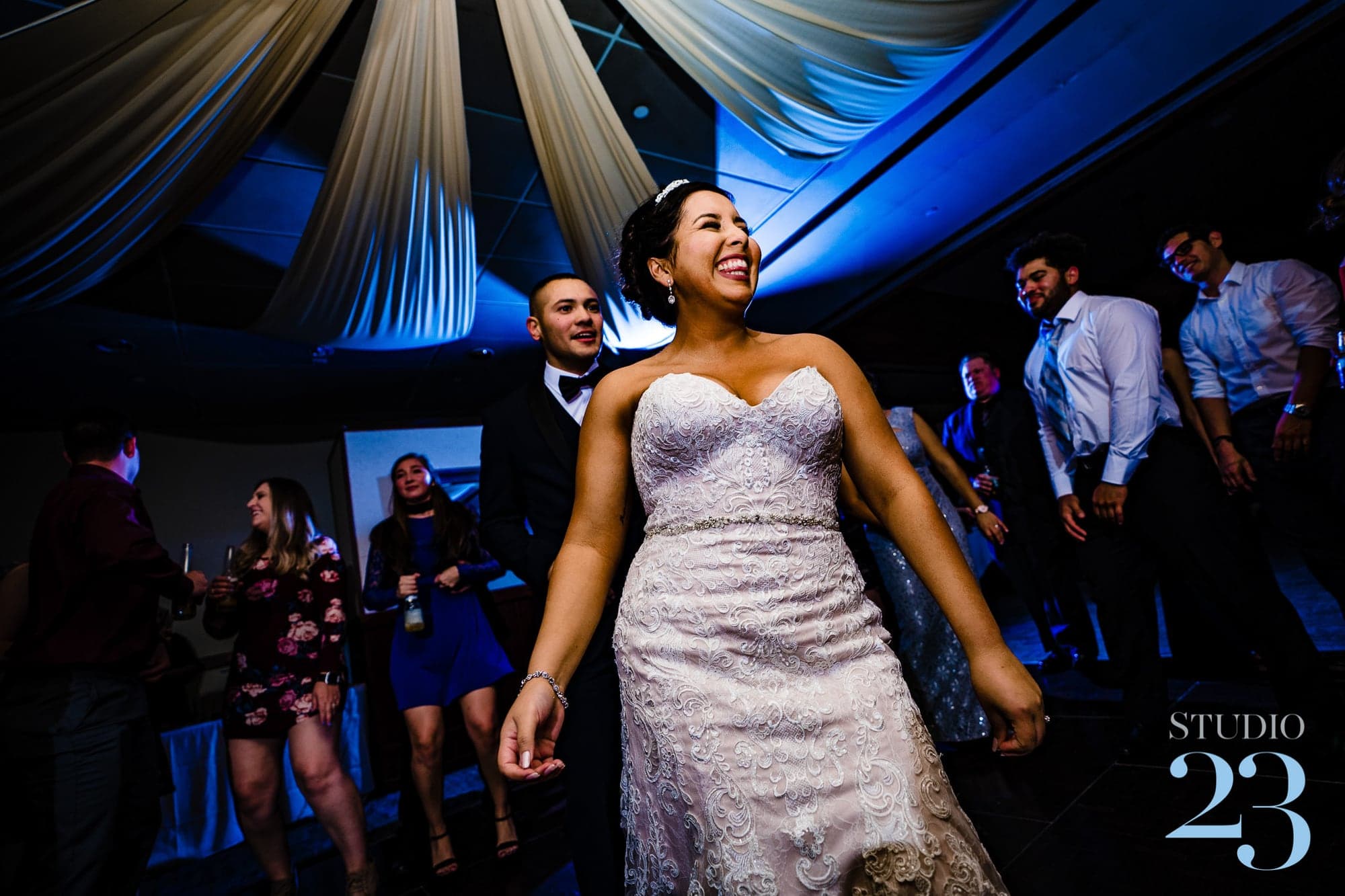 Guests dancing at the Wood Ranch reception