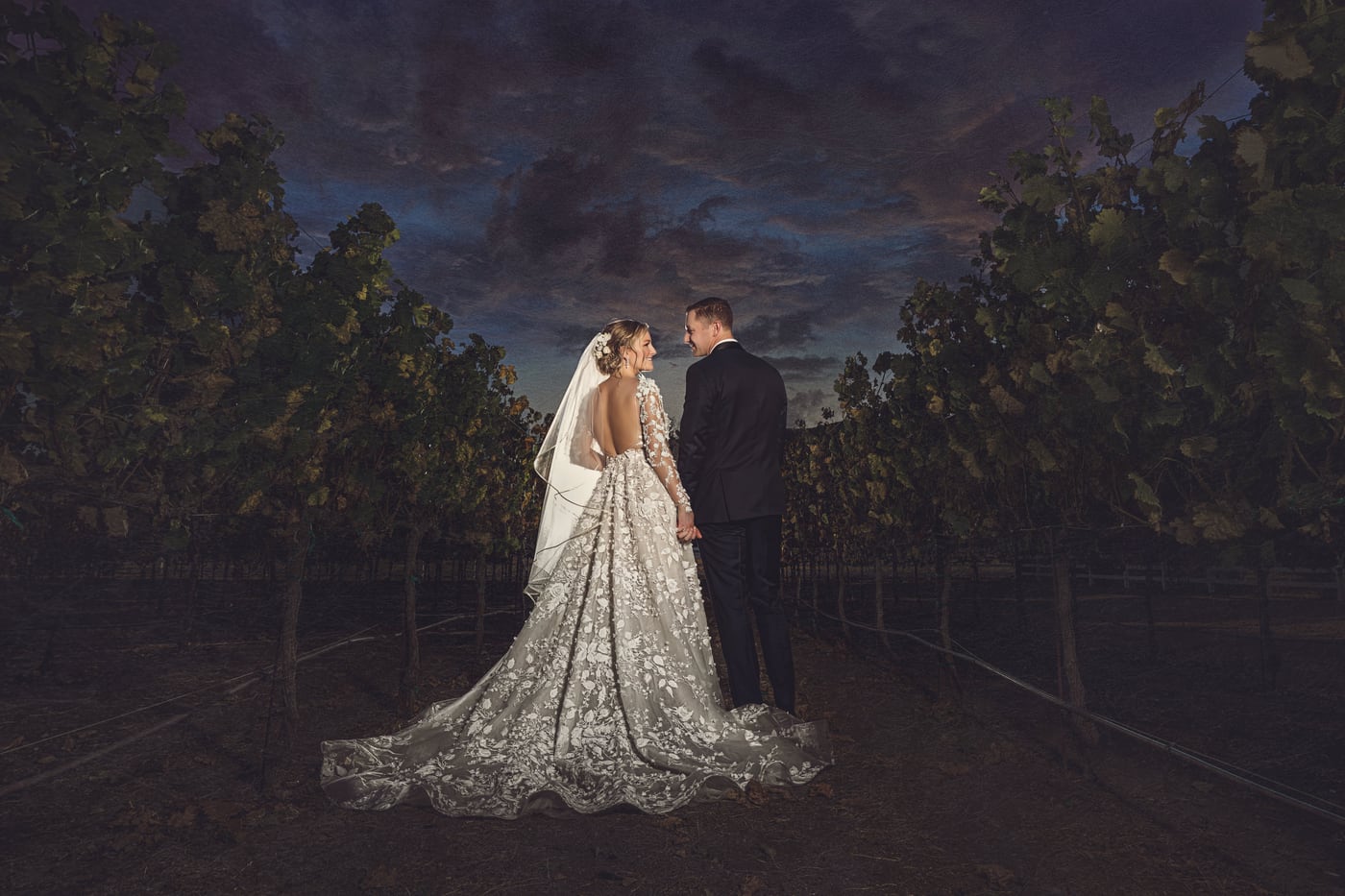 North Texas wedding reception under string lights at dusk